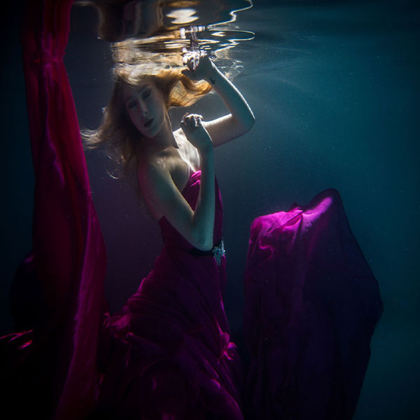 Pink Dress Underwater will make a perfect background for any fresh or salt water tank or aquarium as well as dry terrariums.