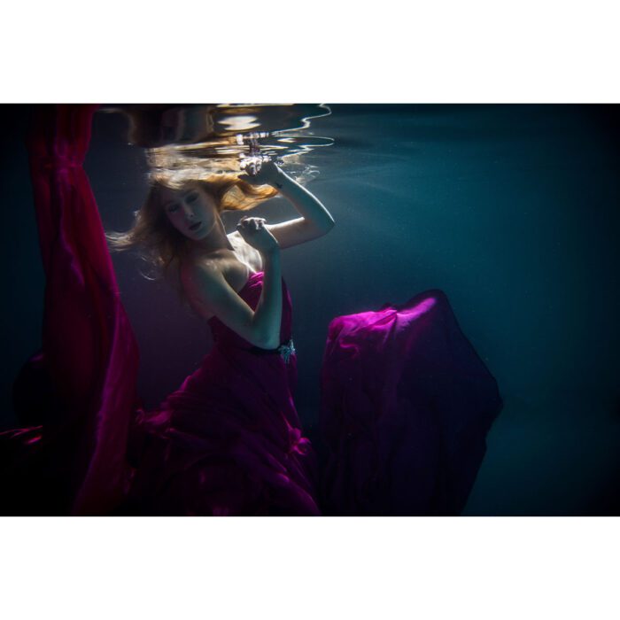 Pink Dress Underwater will make a perfect background for any fresh or salt water tank or aquarium as well as dry terrariums.