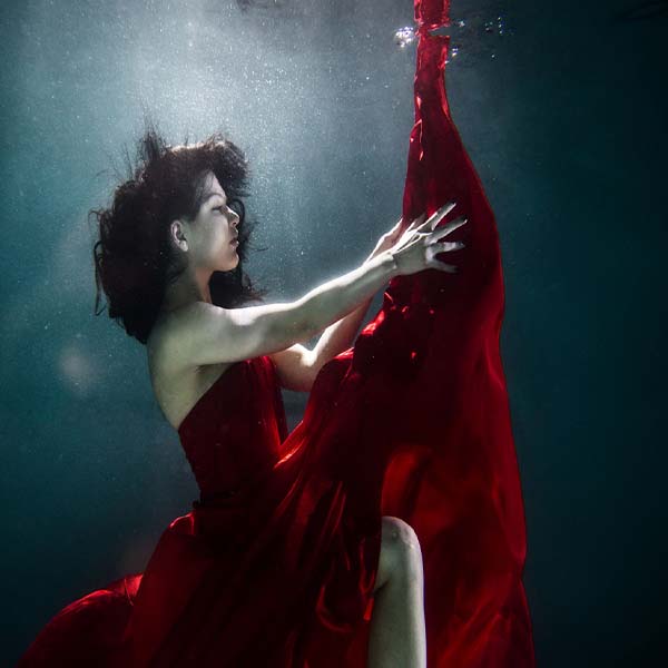 Red Dress Underwater will make a perfect background for any fresh or salt water tank or aquarium as well as dry terrariums.