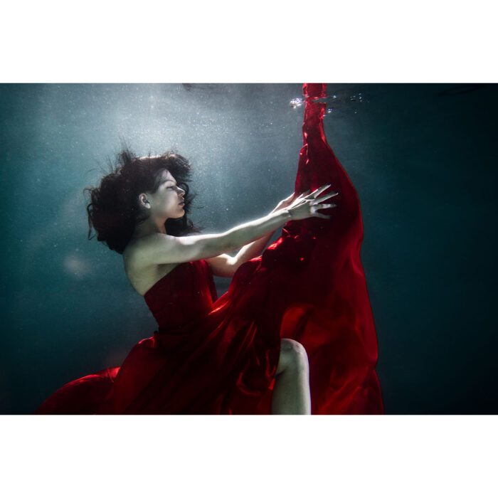 Red Dress Underwater will make a perfect background for any fresh or salt water tank or aquarium as well as dry terrariums.