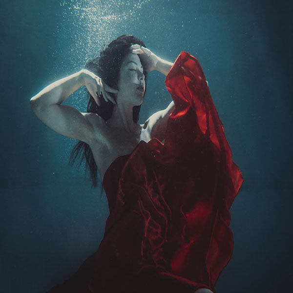 Red Dress Underwater VI will make a perfect background for any fresh or salt water tank or aquarium as well as dry terrariums.