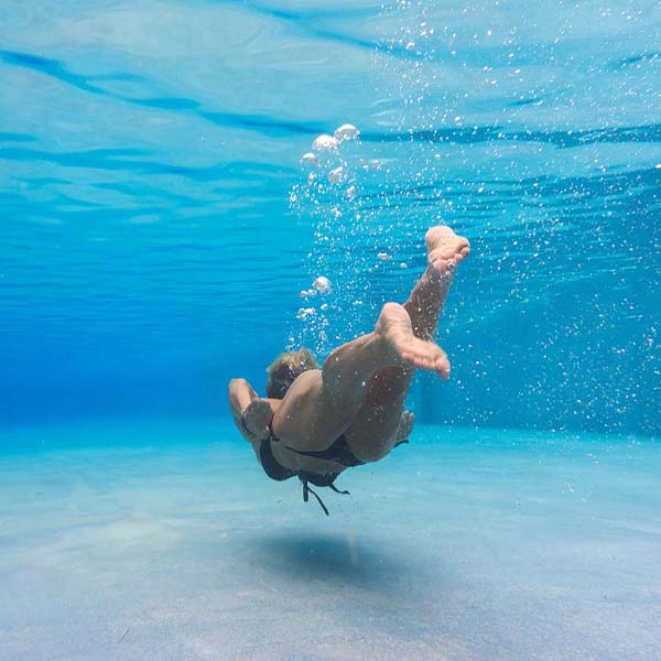 Woman Swimming Away will make a perfect background for any fresh or salt water tank or aquarium as well as dry terrariums.