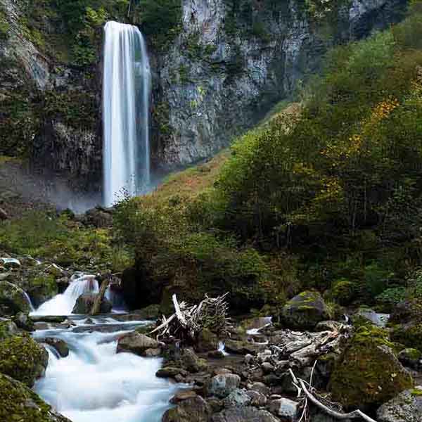 Flowing Mountainous Waterfall will make a perfect background for any fresh or salt water tank or aquarium as well as dry terrariums.